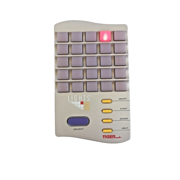 Vintage 1995 Tiger Lights Out Electronic Handheld Puzzle Game Works - Picture 1 of 9